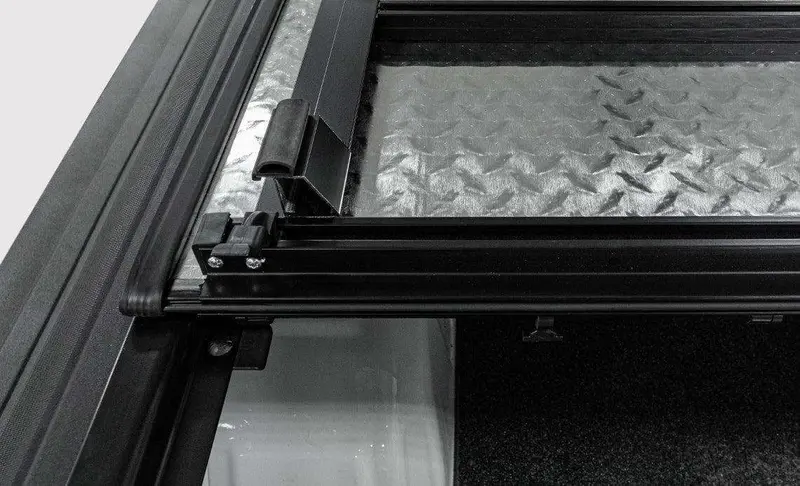Lomax Professional Series Diamond-Plate Tonneau Cover With Single-Rail Design 1